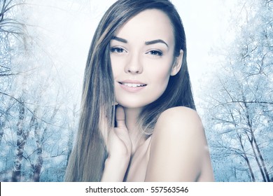 Head and shoulders of young woman with eyes closed over winter forest. Cryotherapy and cryosauna concept