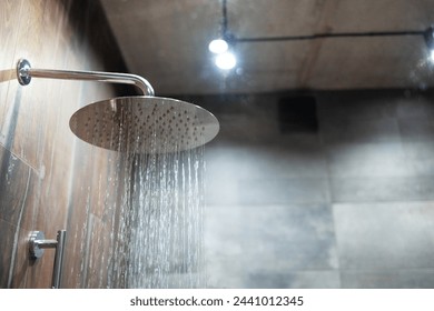 Head shower while running water in bathroom.