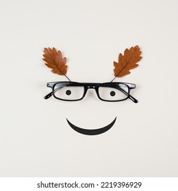 Head With A Smiling Face, Eyeglasses And Foliage, Mental Health Concept, Positive Mindset, Support And Evaluation Symbol