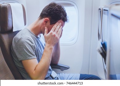 Headache In The Airplane, Man Passenger Afraid And Feeling Bad During The Flight In Plane