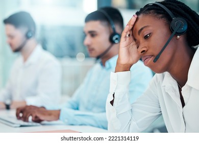 Headache, call center and burnout with a black woman in telemarketing looking tired or exhausted. Consulting, compliance and customer service with health issues of a female crm representative