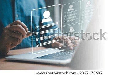Headhunter using pen to tick correct mark to screening and select the optimum resume application form , Human development and recruitment to interview and join with company concept.