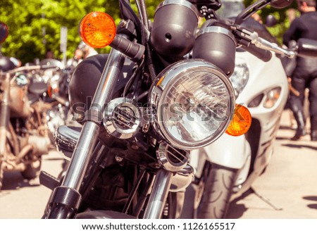 Similar – Motorcycle headlights with senior man steering