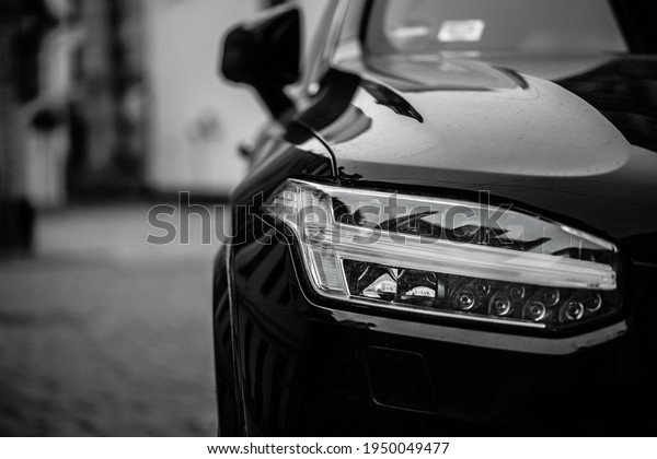 Headlight of black car.\
Led car headlight