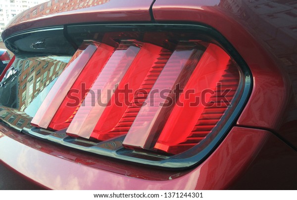 Headlight and bumper\
of car,  Kyiv, Ukraine\
