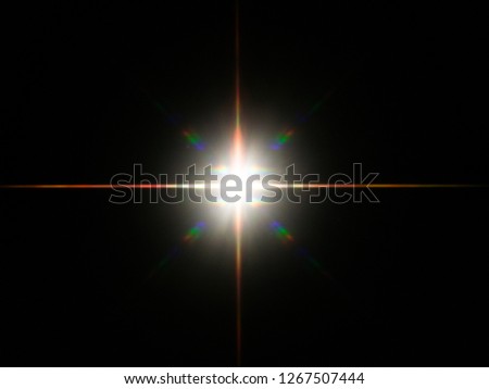 Headlight or camera flash on a dark reflective background reveals vivid colorful star burst.