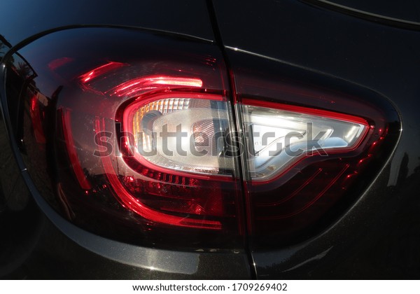 headlight of a car seen from the side and\
all its details, modern and stylized\
piece