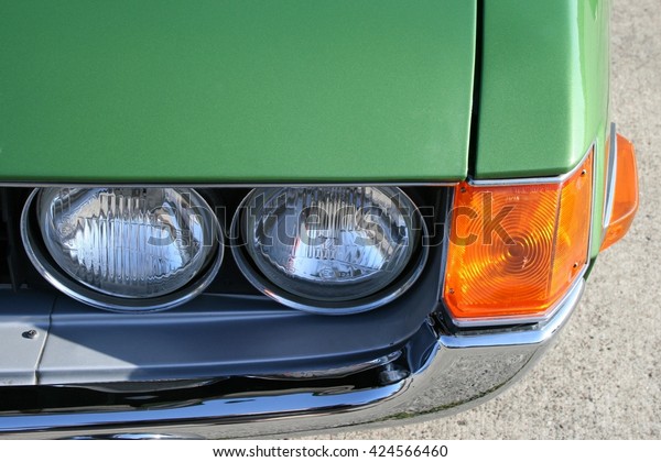 Headlight and\
direction indicator of a vintage\
car