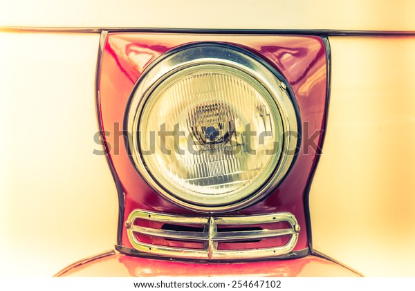 Headlight lamp vintage car - vintage effect\
and light leak filter\
processing
