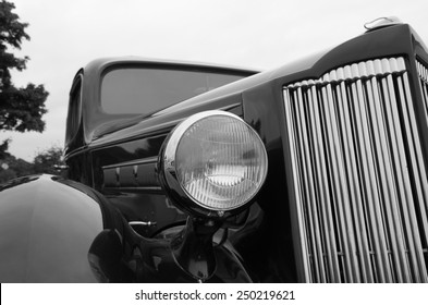 Headlight Of Old Classic Packard Six Touring Sedan From 1937.