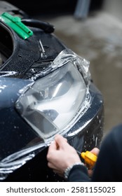 Headlight polishing and protective PPF application for enhanced clarity and long-lasting protection. Professional detailing service ensuring a sleek finish and improved durability.