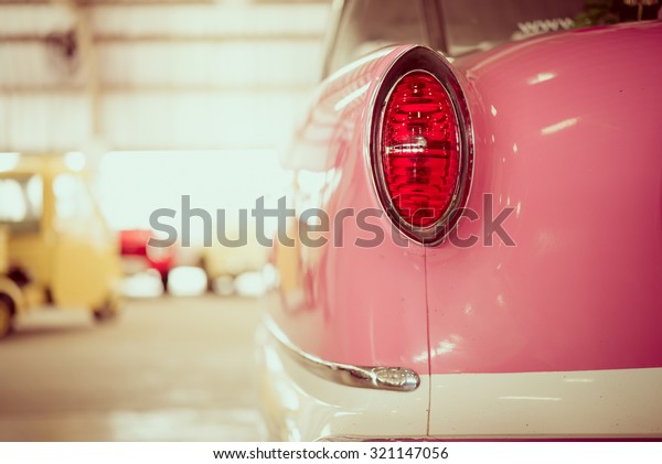 Headlight rear lamp vintage car - selective focus\
& vintage effect\
style