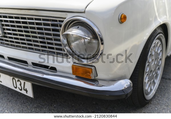 Headlights of an old veteran\
car.
