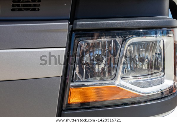 Headlights on the bumper\
truck
