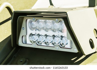 Headlights And Parking Lights Of A Truck, Auto, Armored Car Or Bulldozer Or Other Construction Equipment