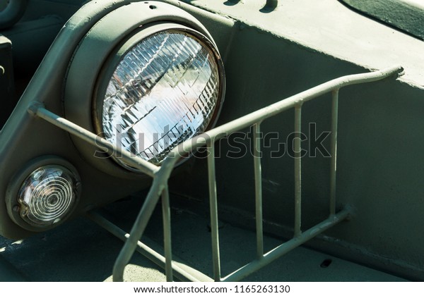 headlights and Parking\
lights of a truck, auto, armored car or bulldozer or other\
construction\
equipment
