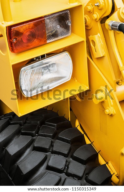 headlights and Parking\
lights of a truck, excavator, tractor or bulldozer or other\
construction\
equipment