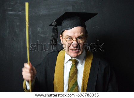 headmaster with cane