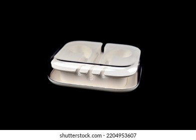 The Headphone Case, Which Protects Against Shocks And Dirt, Is White From The Side