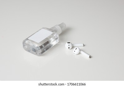 Headphone Cleaning Airpods Sanitizer, Spir. Prevention Of Coronavirus Infection. Headphone Disinfection Coronavirus, Covid 19, Quarantine. Isolated White Background