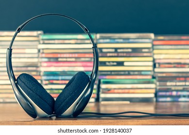 headphone on stack of cd background