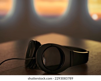 Headphones, airplane, sunset, travel, music - Powered by Shutterstock