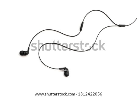 Headphones for listening music and sounds on portable devices on a white background. Ear plugs. Earflaps for a mobile phone. Headset from two earpieces. Playing music.