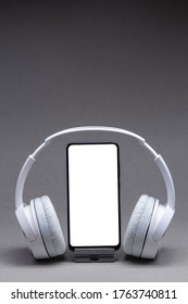 Headphones With Smartphone Mockup, Isolate On White, Music Online Concept.