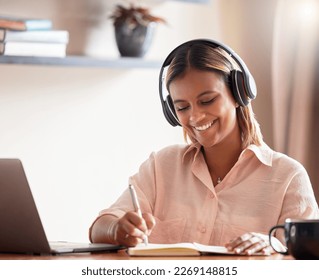 Headphones, student and woman writing on book in home, studying and research. Distance learning, education scholarship and smile of happy female with notebook while streaming podcast, radio or music. - Shutterstock ID 2269148815