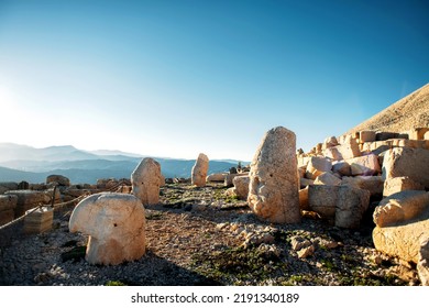 Heads Of The Statues On Nemrut Dag On The Sunset. Travel Concept Photo. Adiyaman, Nemrut Mountain, Turkey