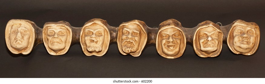 Heads Symbolizing The Seven Deadly Sins