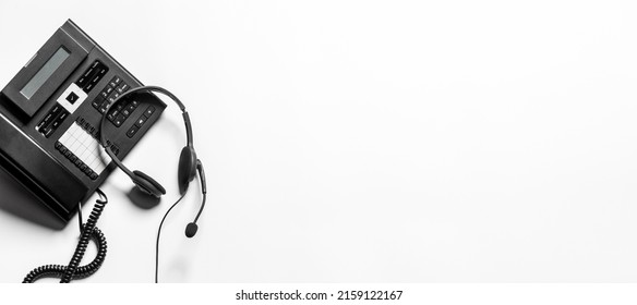 Headset and customer support equipment at call center ready for actively service , Communication support, call center and customer service help desk. for (call center) concept .