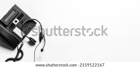 Headset and customer support equipment at call center ready for actively service , Communication support, call center and customer service help desk. for (call center) concept .
