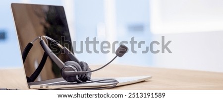 Headset and customer support equipment at call center service.