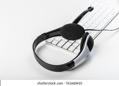 headset on keyboard computer laptop