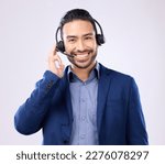 Headset portrait of happy man isolated on a white background call center, telecom job or global support. International callcenter agent, consultant or business person face in studio communication