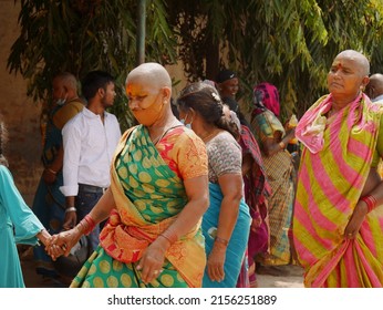 Headshave Women Going Together Between Public Crowd, Wearing Saree Lady, Traditional South Religious Female At Varanasi Uttar Pradesh In India Shot Captured On March 2022