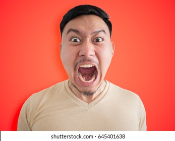 Headshot Of Angry And Mad Face Of Asian Man With Beard And Mustache.