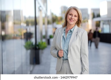 Headshot of attractive middle aged business woman professional, possibly accountant, architect, businesswoman, lawyer, attorney,