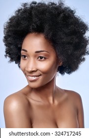 Headshot Of Attractive Young Black African Model Smiling In Studio With Smooth Complexion Flawless Skin, Skincare Beauty Concept