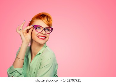 Headshot Attractive Young Woman Pinup Girl Holding Glasses Laughing Smiling Happy Looking At You Isolated On Pink Color Background. 50s Retro Vintage Hair Style. Positive Human Emotions Body Language