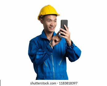 Headshot of engineer young man using mobile phone Asian man isolated on white background.