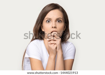 Similar – Image, Stock Photo Fearful eyes of a woman