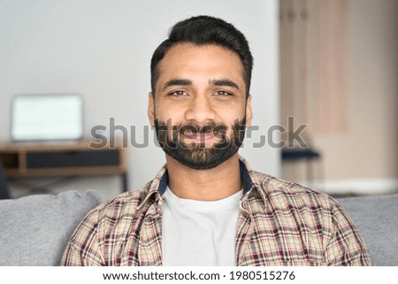 Similar – Image, Stock Photo Bearded hispanic man wearing a red sweater with open arms in profile offering something while smiling at camera, isolated over blue background.