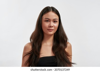 Headshot Portrait Of Beautiful Millennial Asian Girl Isolated On White Studio Background. Profile Picture Of Young Vietnamese Woman Look At Camera, Have Photoshoot. Diversity, Mixed Race Ethnicity.