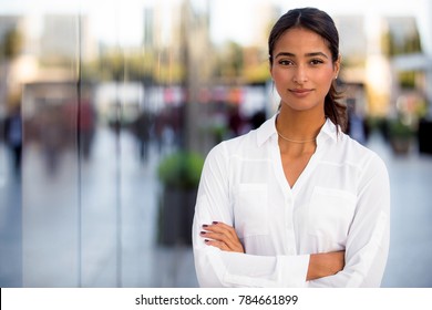 Headshot portrait of a beautiful multiethnic female business professional at work office building