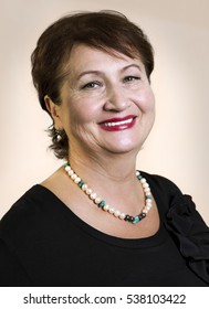 Headshot Portrait Of A Cheerful Elderly Woman Smiling