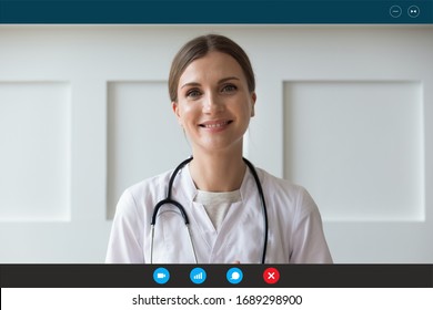 Headshot portrait screen application view of smiling female nurse talking on video call with sick patient at home, happy woman doctor or GP consult client online using Web conference on computer