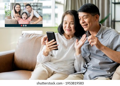 Headshot Portrait Screen Application View Of Happy Asian Family Multi Generation Parent, Grandparent And Daughter Talk On Video Call Online, Webcam Chat On Laptop, Quarantine At Home New Lifestyle