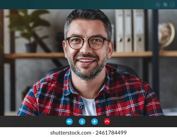 Headshot portrait screen application view of middle age smiling man sitting at home office having online meeting video zoom call talking with friends relatives family partners workers - Powered by Shutterstock